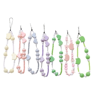Handmade beaded phone charms with pearlescent heart beads in seven assorted colors