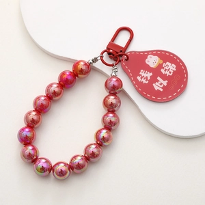 Festive red beaded phone charm strap with iridescent beads and lucky charm pendant