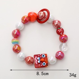 Handmade beaded strawberry phone strap with cartoon face and red metallic charms
