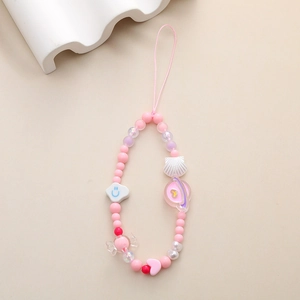 Detailed view of pink cartoon bear beaded phone charm with colorful acrylic beads