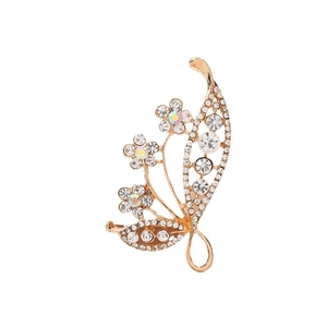 Golden flower and butterfly clover brooch with sparkling colorful crystals and diamonds