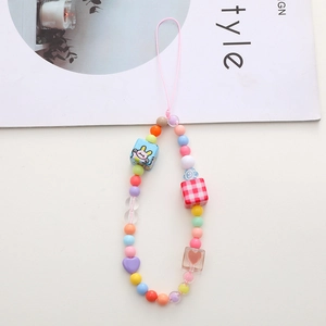 Detail of candy-colored beaded phone strap with cartoon rabbit and checkered pattern blocks
