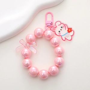 Pink pearlescent beaded bear keychain with bow and cute bunny acrylic charm