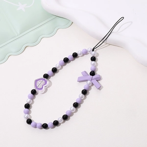 Beaded phone strap with purple heart and bow charm for minimalist mobile decoration
