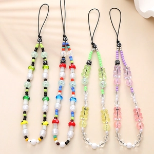 Colorful beaded phone straps with mushroom and bear charms in four vibrant color sets
