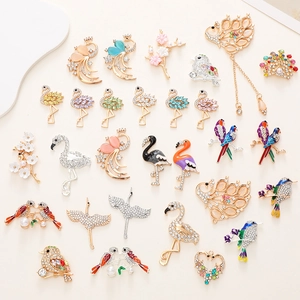 Colorful resin peacock and flamingo shoe charms with sparkling rhinestones and flower details