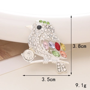 Colorful bird brooch pin with crystals measuring 3.8cm by 3.5cm and weighing 9.1g