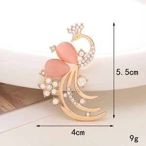 Peacock brooch detail with pink opal stones and white rhinestones, size 5.5cm by 4cm