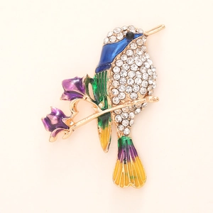 Exquisite gold metal hummingbird brooch with colorful enamel and sparkling rhinestones
