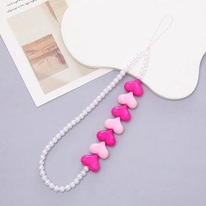 Roze hart en parel kralen telefoonriem met hartvormige hangers voor dames