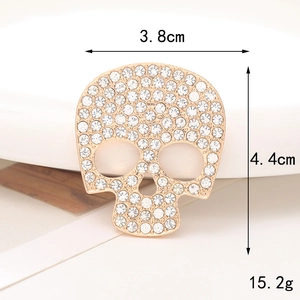 Vista macro del charm a teschio 3,8x4,4 cm con strass bianchi e misure dettagliate