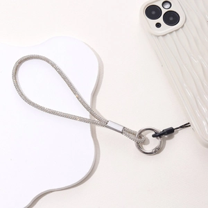 Luxurious silver rhinestone wrist strap for phone with polished metal clasp and ring