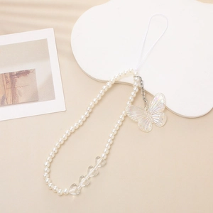 Close-up of pearl bead phone strap with iridescent butterfly charm and heart beads