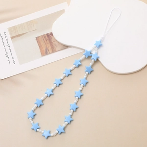 Detail of light blue frosted star beads phone strap with white accents on cream background