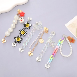 Colorful acrylic phone charm collection with pearls heart buckles and bear charms