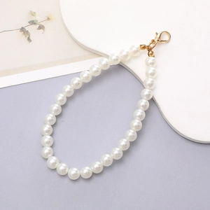 Elegant white pearl phone strap with golden lobster clasp for bags and keychains