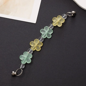 Acrylic floral beaded phone strap with yellow and green resin flower charms and metal clasp