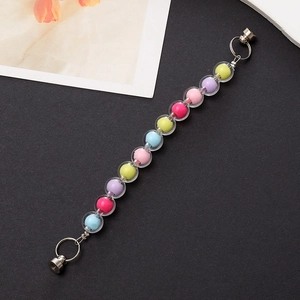 Close-up of colorful acrylic double-layer beads with secure magnetic metal clasp