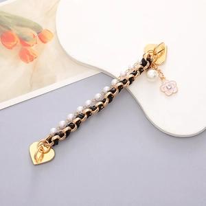 Colorful acrylic phone chain with gold metal links, pearls, and heart charm accessory