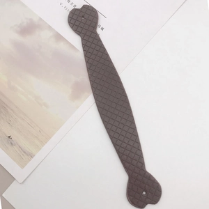 Close-up of brown plaid synthetic leather heart-shaped strap handle with fixing holes