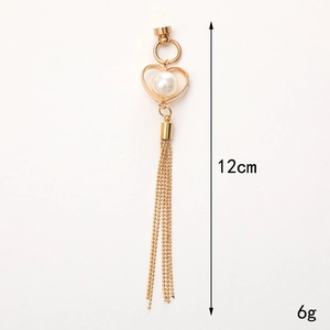 Elegant 12cm gold tassel charm with hollow heart and white pearl for DIY phone case decor