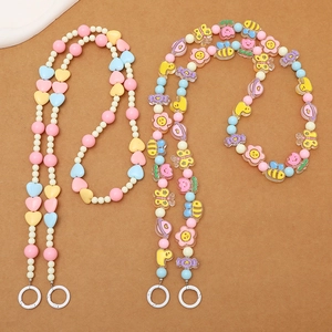 Colorful handmade beaded crossbody lanyard for phones with heart and cartoon charms