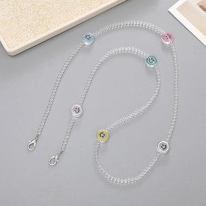 Handmade beaded cross-body phone chain with colorful smiley faces and acrylic stars