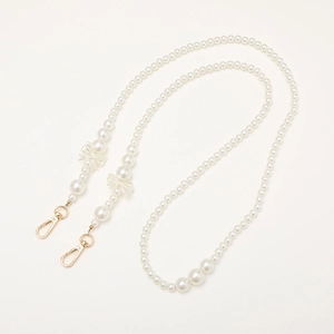 Crossbody pearl phone strap with elegant white bows and golden metal lobster clasps