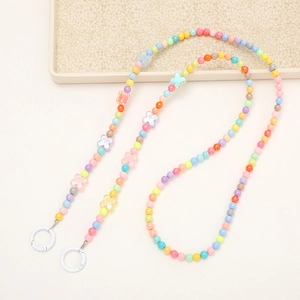 Chaîne longue en perles acryliques avec étoiles et papillons pour sacs et tasses