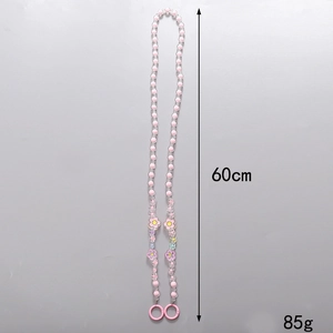 Pink beaded crossbody phone lanyard with floral charms, 60cm long and weighing 85g