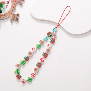 Close-up of Santa Claus and Christmas tree beaded phone wrist strap with pearls