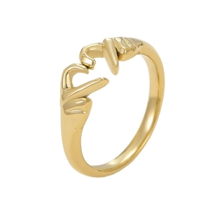 Adjustable golden open ring featuring a creative love heart gesture hand design