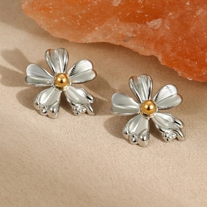 Exaggerated metal flower earrings in silver and gold minimalist stainless steel style