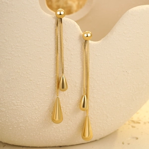 Élégantes boucles d'oreilles pendantes en acier inoxydable doré au design goutte