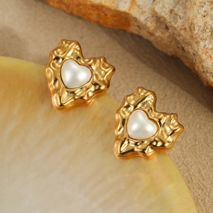 Irregular lava gold heart stud earrings featuring elegant creamy white faux pearls