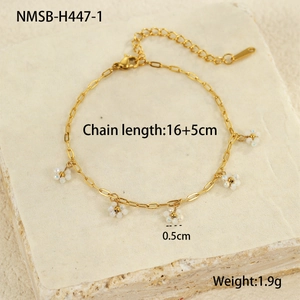 Detail of gold beaded flower bracelet with lobster clasp and adjustable chain