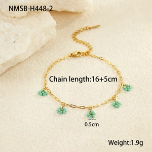 Detail view of gold beaded flower bracelet with 16 plus 5cm adjustable chain and measurements
