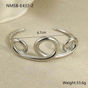 Detail view of silver stainless steel multi-layer cross-line bangle with 6.7cm diameter