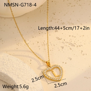 Detailed size view of a 18K gold plated heart pendant with letter L and zircon border