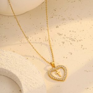 Gold plated stainless steel heart necklace with cross pendant and zircon inlay