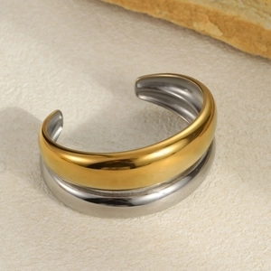 Minimalist thick two-tone stainless steel C-shape open bangle in polished gold and silver