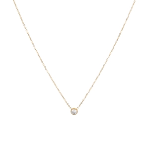Collana minimalista in titanio dorato con ciondolo solitario tondo in zirconia scintillante
