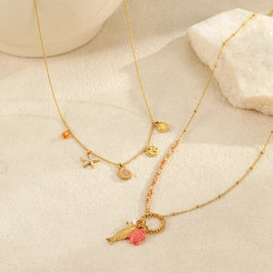 Oceaan thema titanium stalen ketting met zeester, schelp en parel bedels in maritieme stijl