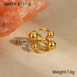 Detailed view of NMSR-B531-2 gold multi-layer ring with geometric metal spheres