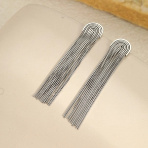 Detail of silver stainless steel long tassel earrings with sleek snake chain fringes