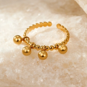 Polished 18k gold plated geometric beaded ring with four dangling round metal spheres