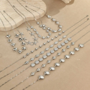 Colliers en acier inoxydable argenté avec pendentifs étoile de mer et coquillages