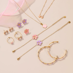 Golden flower and bow jewelry set for girls with colorful enamel and crystal accents