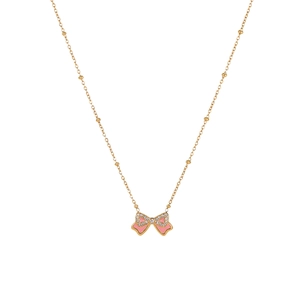 Golden beaded necklace featuring a pink enamel bow pendant with sparkling white crystals