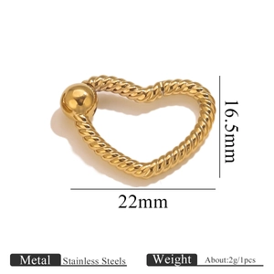 Detailed macro view of heart-shaped stainless steel spring clasp with twist texture